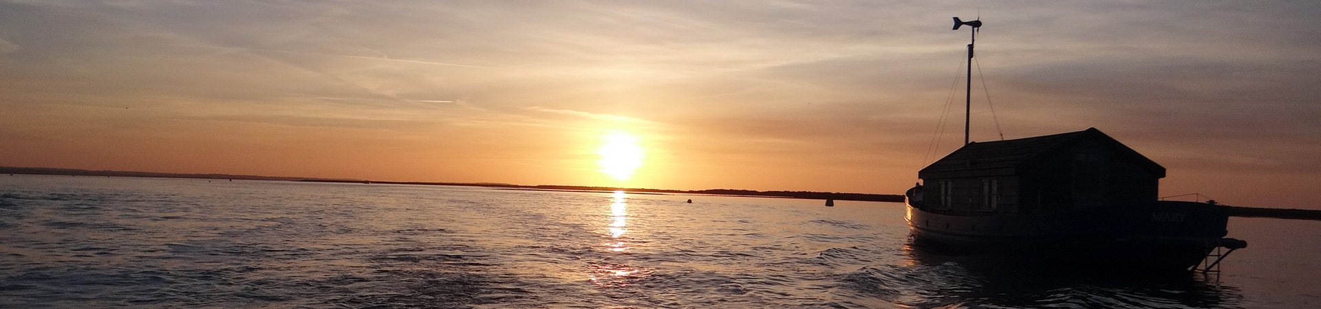 Sunset over the water at Blakaney Point