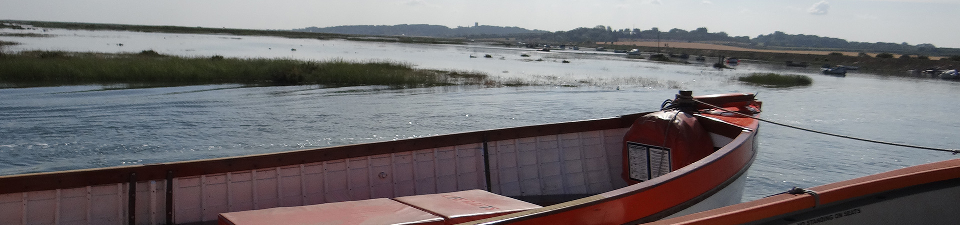 Beans Boats ferries against the quay on a high tide